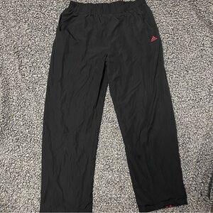 Black Adidas track pants